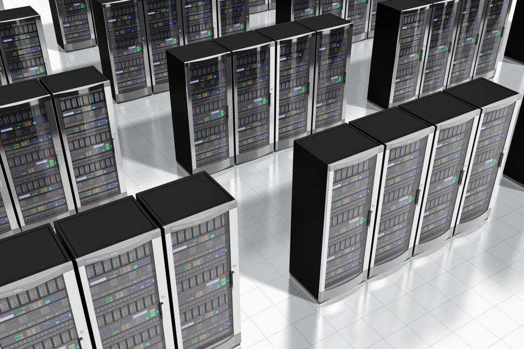 Top-down view of a modern data center with neatly arranged server racks on a white reflective floor, representing IT infrastructure and asset management.