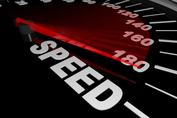 Speedometer graphic symbolizing speed achieved through structured processes and clear governance in IT asset disposition.